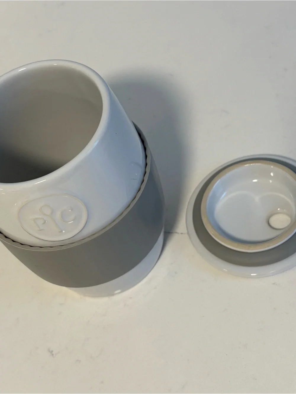 Pampered Chef White Ceramic Travel Mug with Gray Silicone Grip